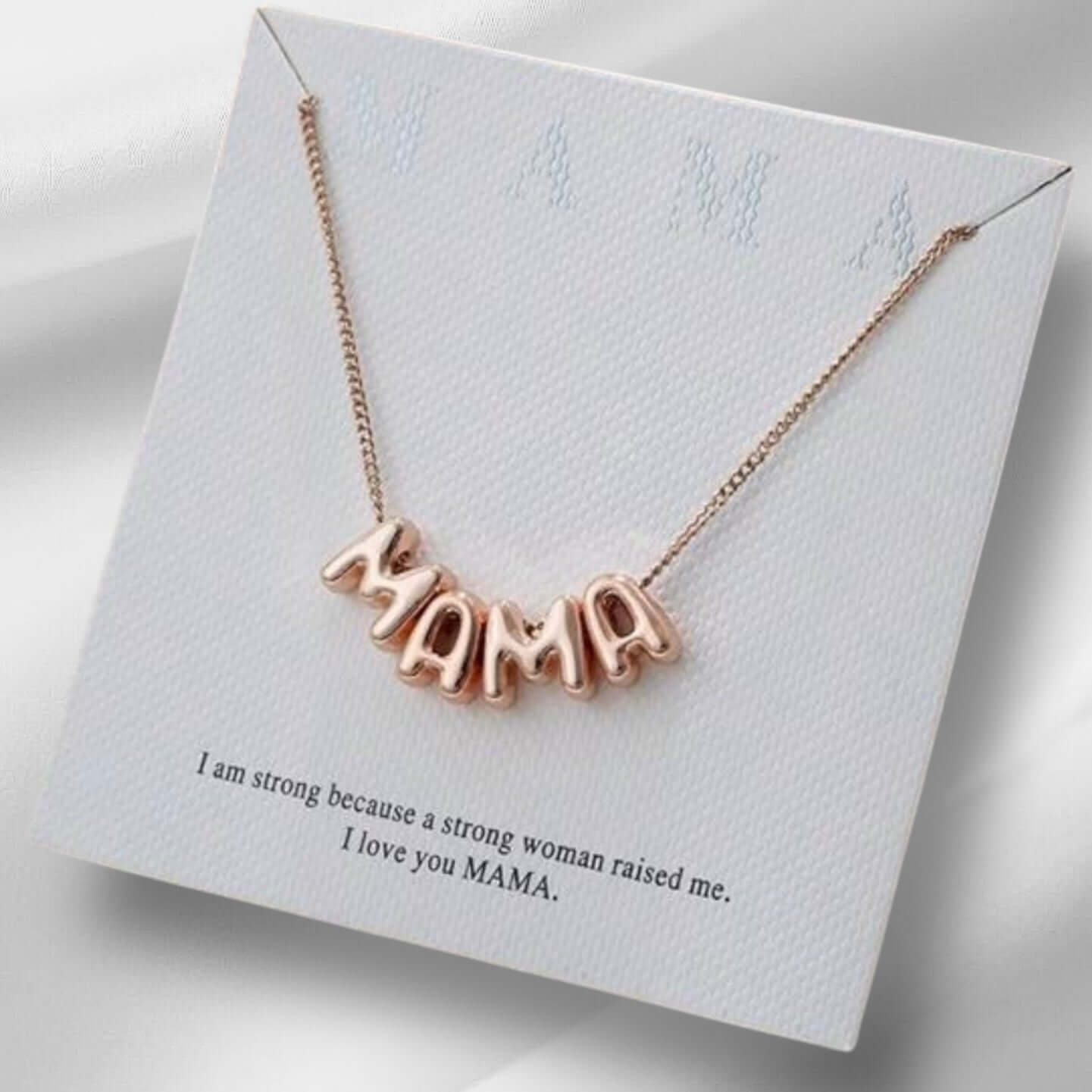 Bubbly Mama Necklace in rose gold tone with playful 'MAMA' charm on a display card.