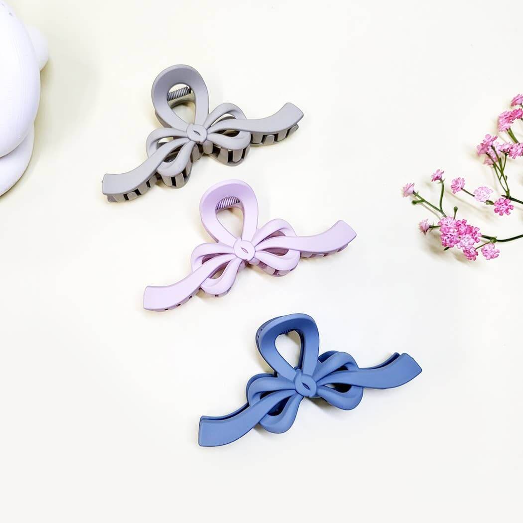 Ribbon Revival Matte Bow Hair Clips in Sage Green, Lilac and Blue, perfect for stylish hair styling.