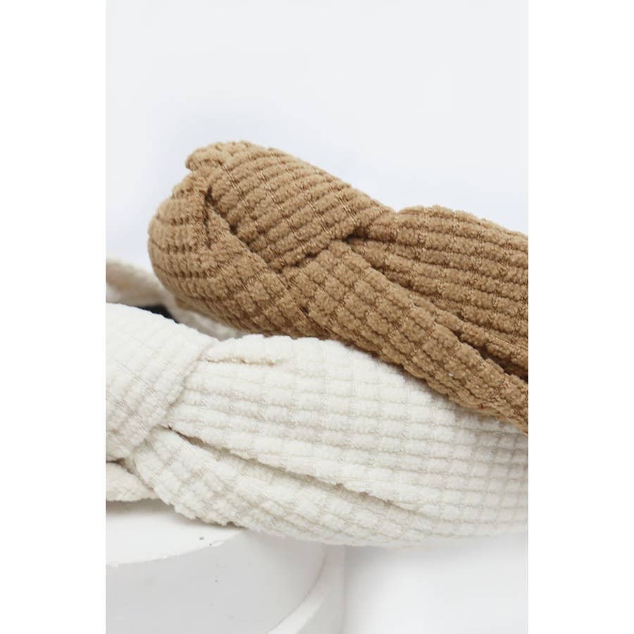 Knot Your Average Headband in beige and cream waffle-textured fabric, stylish and cozy accessory.