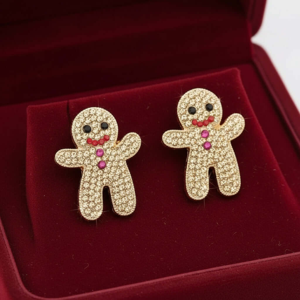 GINGERBREAD BLING EARRINGS featuring jeweled gingerbread man design with golden rhinestones and colorful accents.