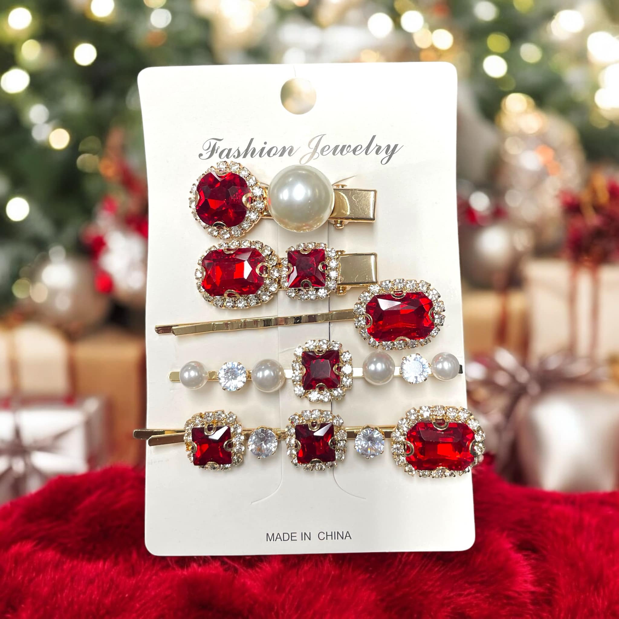 Set of five jeweled hair clips with ruby red stones and pearls on gold tone hair pins, ideal for holiday elegance.