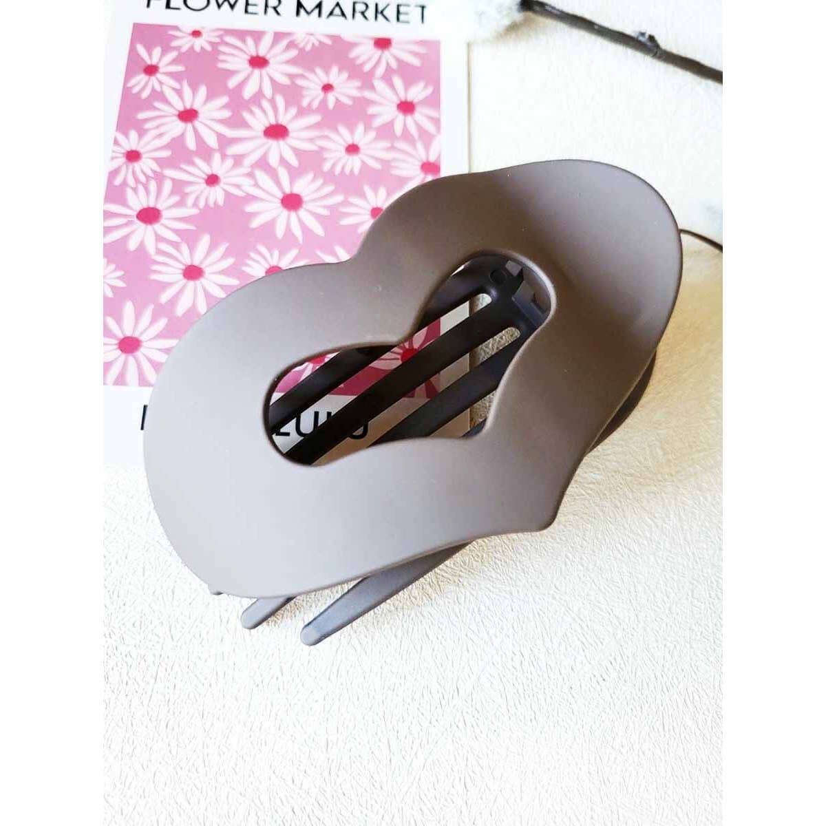 LOVE YOU MORE HAIR CLIPS in matte neutral color, heart-shaped claw clip for stylish hair management.