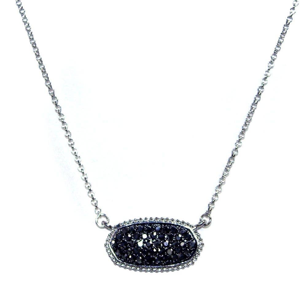 Druzy oval pendant necklace in black, featuring a sparkling textured stone on a silver chain.