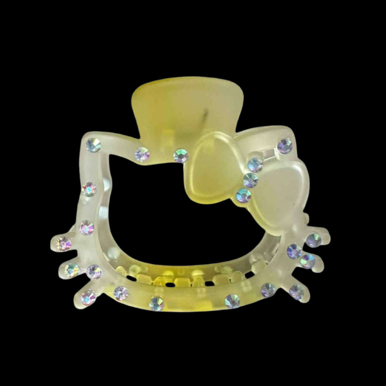 Large kitten hair clip with rhinestones and bow, perfect for playful hairstyles. Measures 3.5" x 2.5".