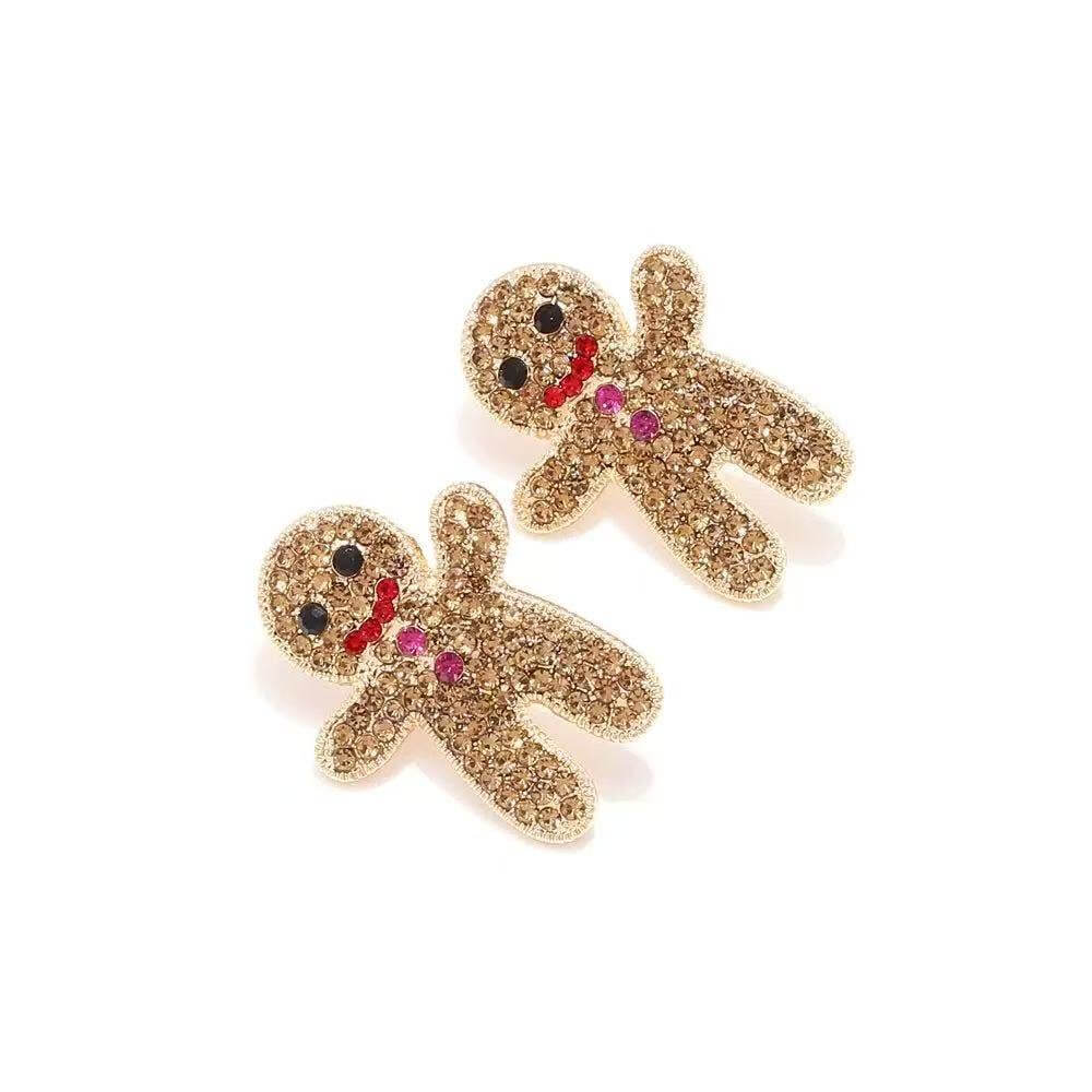 GINGERBREAD BLING EARRINGS featuring jeweled gingerbread man design with golden rhinestones and festive colors.