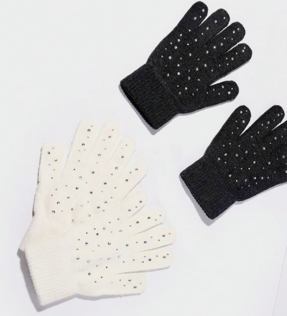 STILL BEJEWELED gloves in winter white and jet black with sparkly rhinestones for warmth and style.