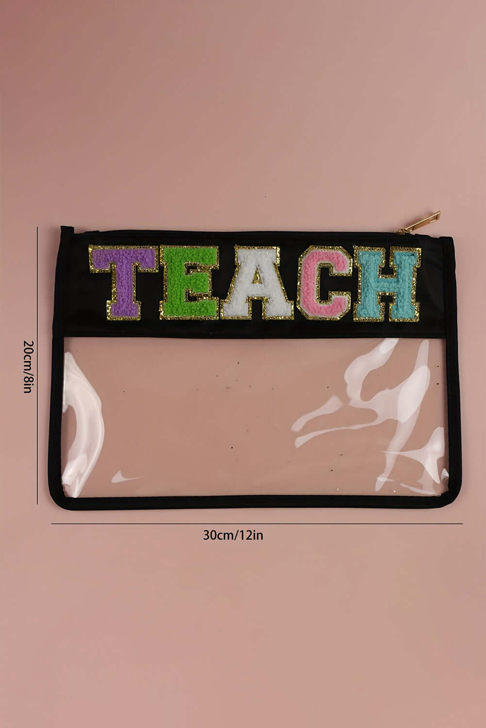 In My Teacher Era clear zipper pouch with colorful glitter TEACH letters on a black background.