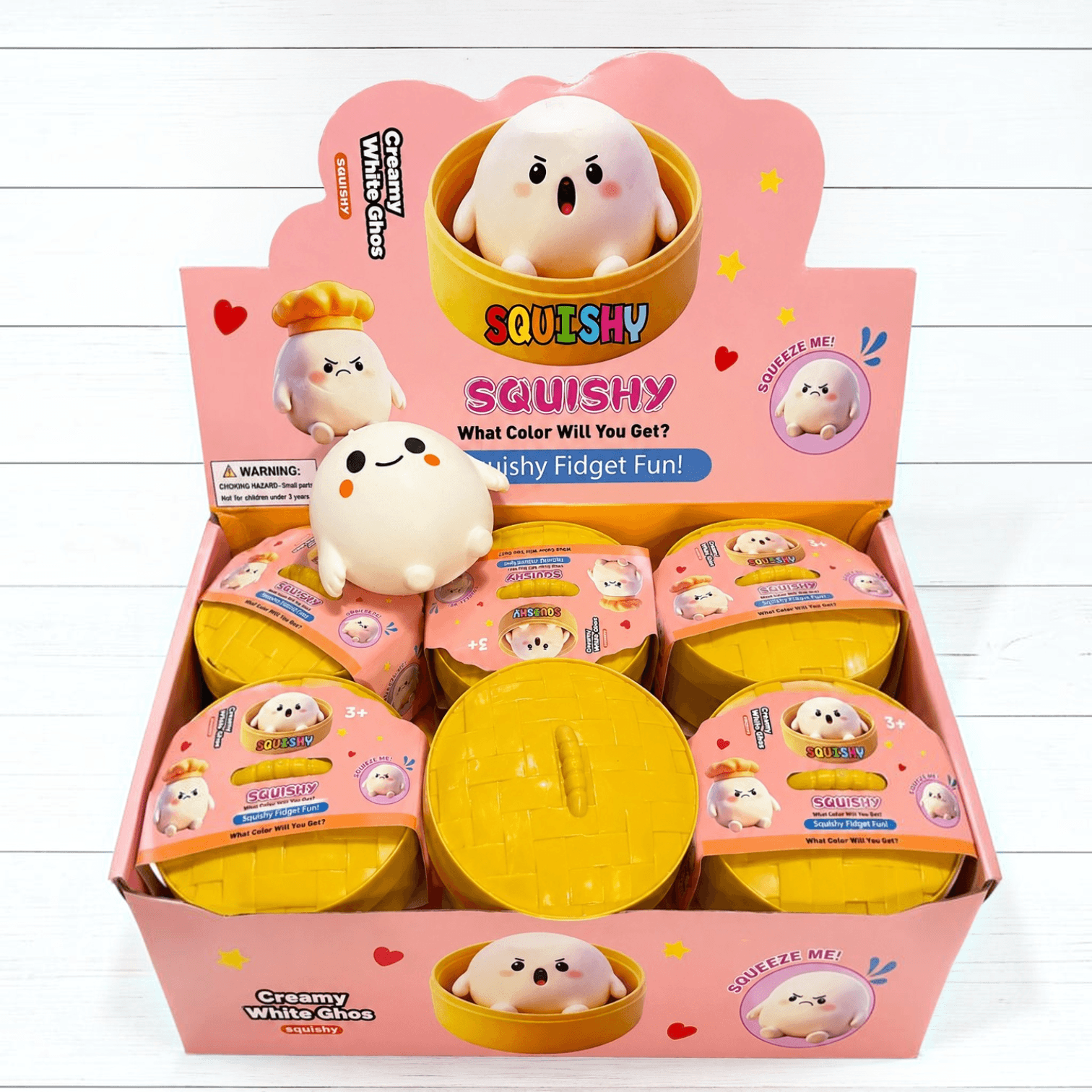 Boo Ghost Dumpling squishy display in colorful packaging, featuring cute ghost designs and sensory play features.