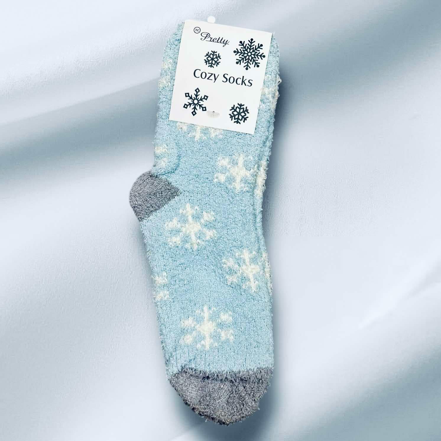 Light blue WINTER SNOWFLAKE Sherpa socks with snowflake design, perfect for winter warmth and style.