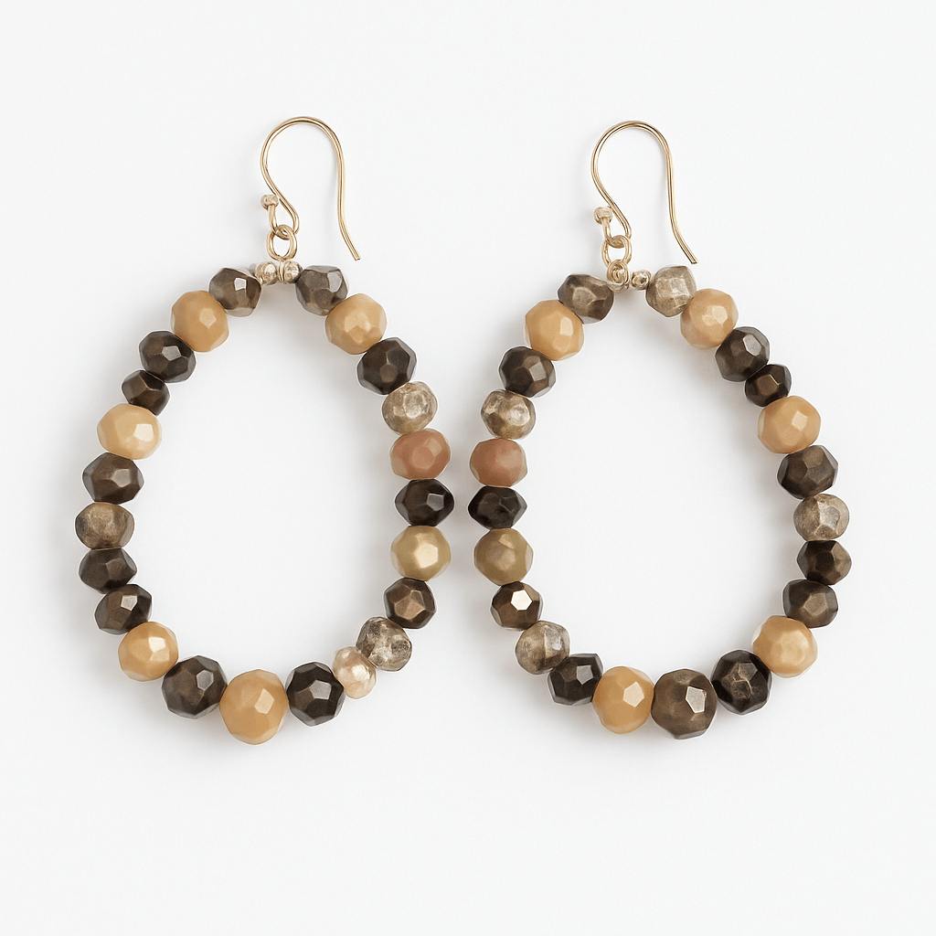 Cherish Beaded Teardrop Earrings with gold-plated hooks and a blend of brown and cream beads for a stylish look.