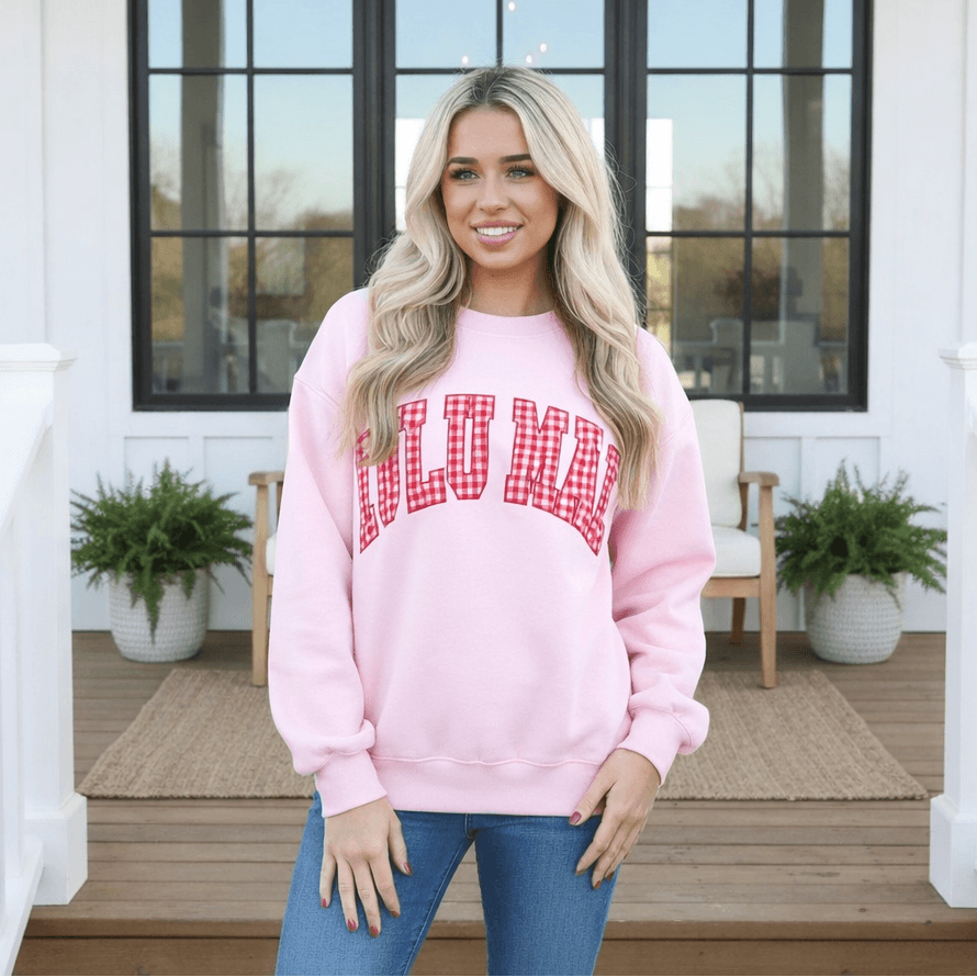 LULU MAC PINK W/ RED GINGHAM CREWNECK worn by a model, showcasing a cheerful, stylish look.