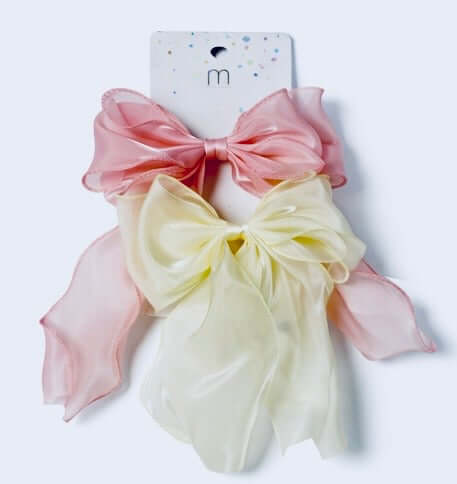 PRETTY PAIR ORGANZA HAIR BOW SET featuring pink and yellow sheer organza bows on a display card.