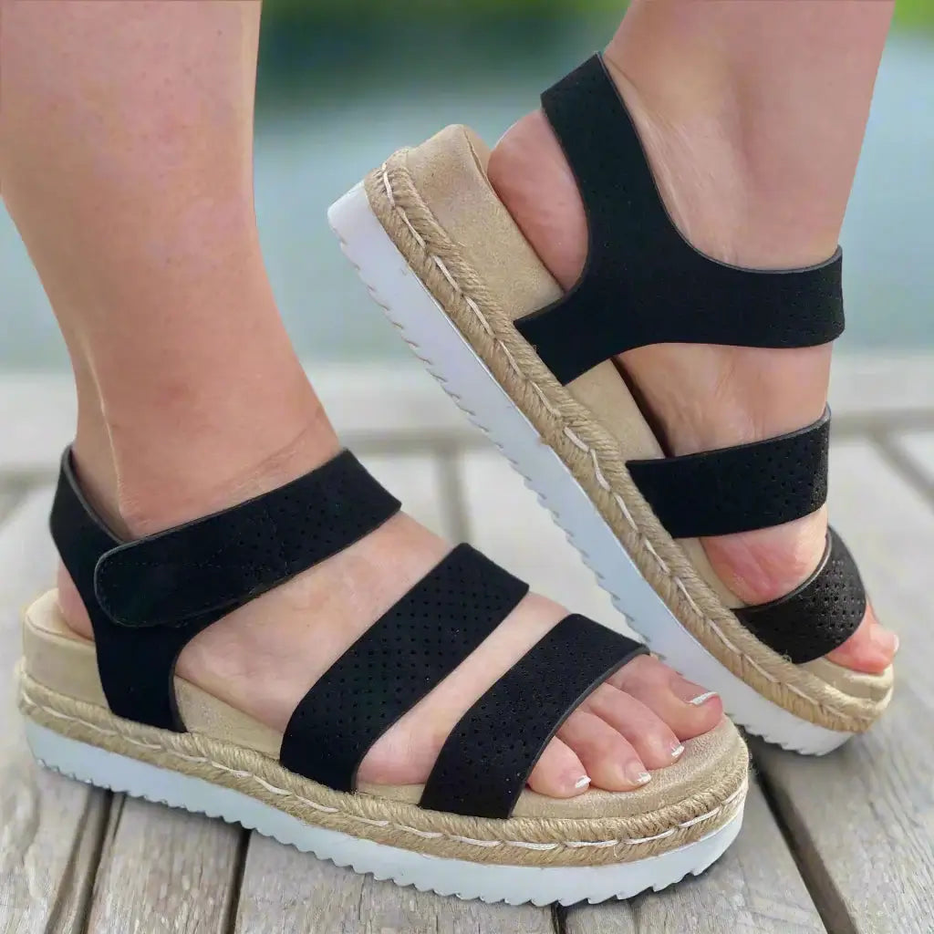 The Club Sandals by Very G in black, featuring a jute-wrapped sole and adjustable straps for comfort.