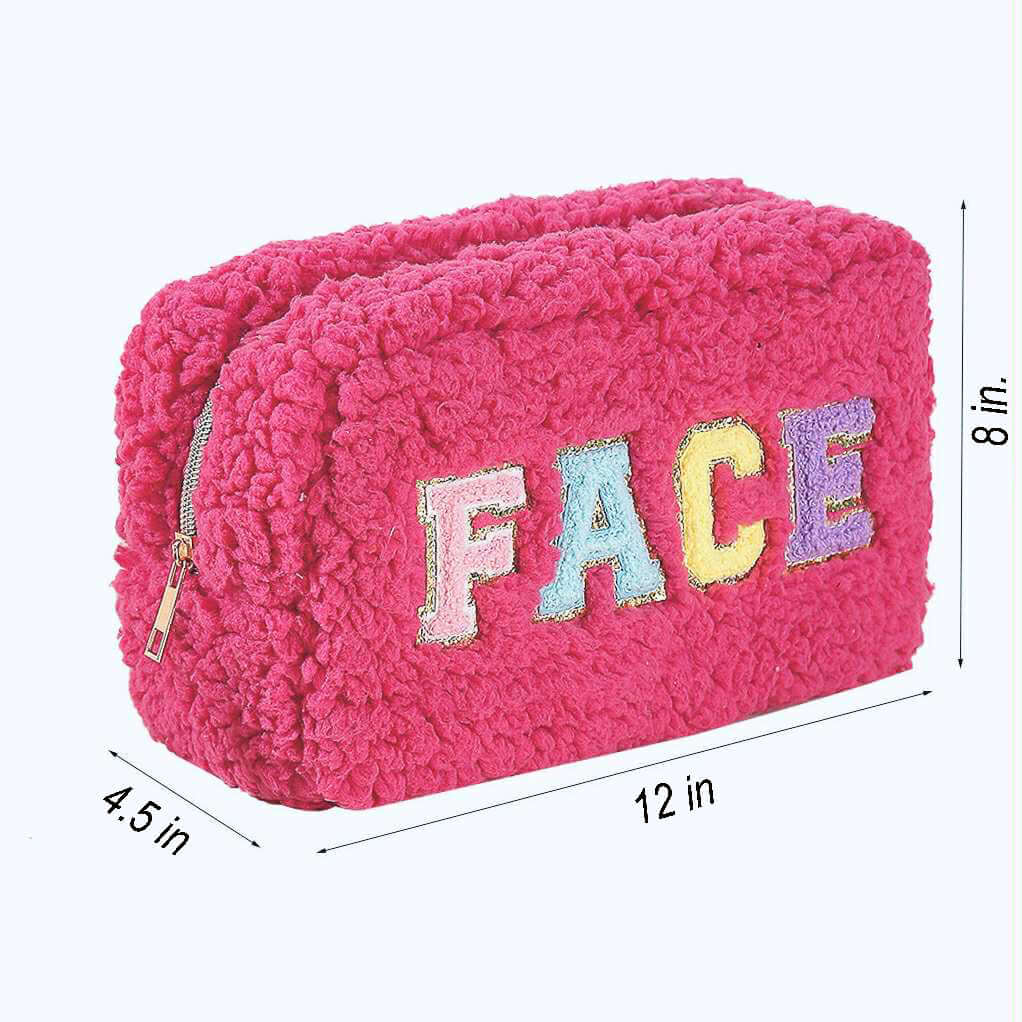 Plush pink FACE it cosmetics bag with pastel chenille letters, measuring 12" W x 8" H x 4.5" D, perfect for travel.