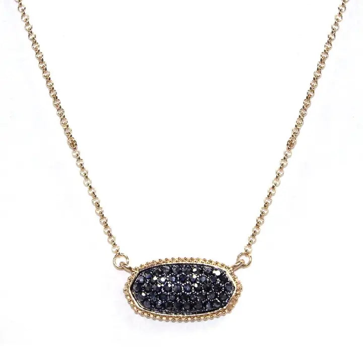 Druzy oval pendant necklace in black with gold chain, perfect for adding elegance to any outfit.
