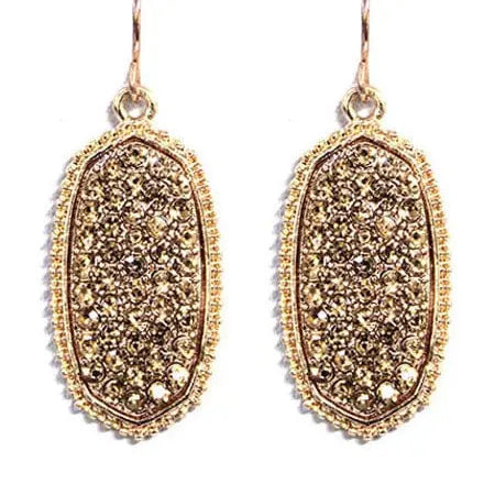 Gold pave rhinestone drop earrings in elegant oval hexagon shape, perfect for adding sparkle to any outfit.