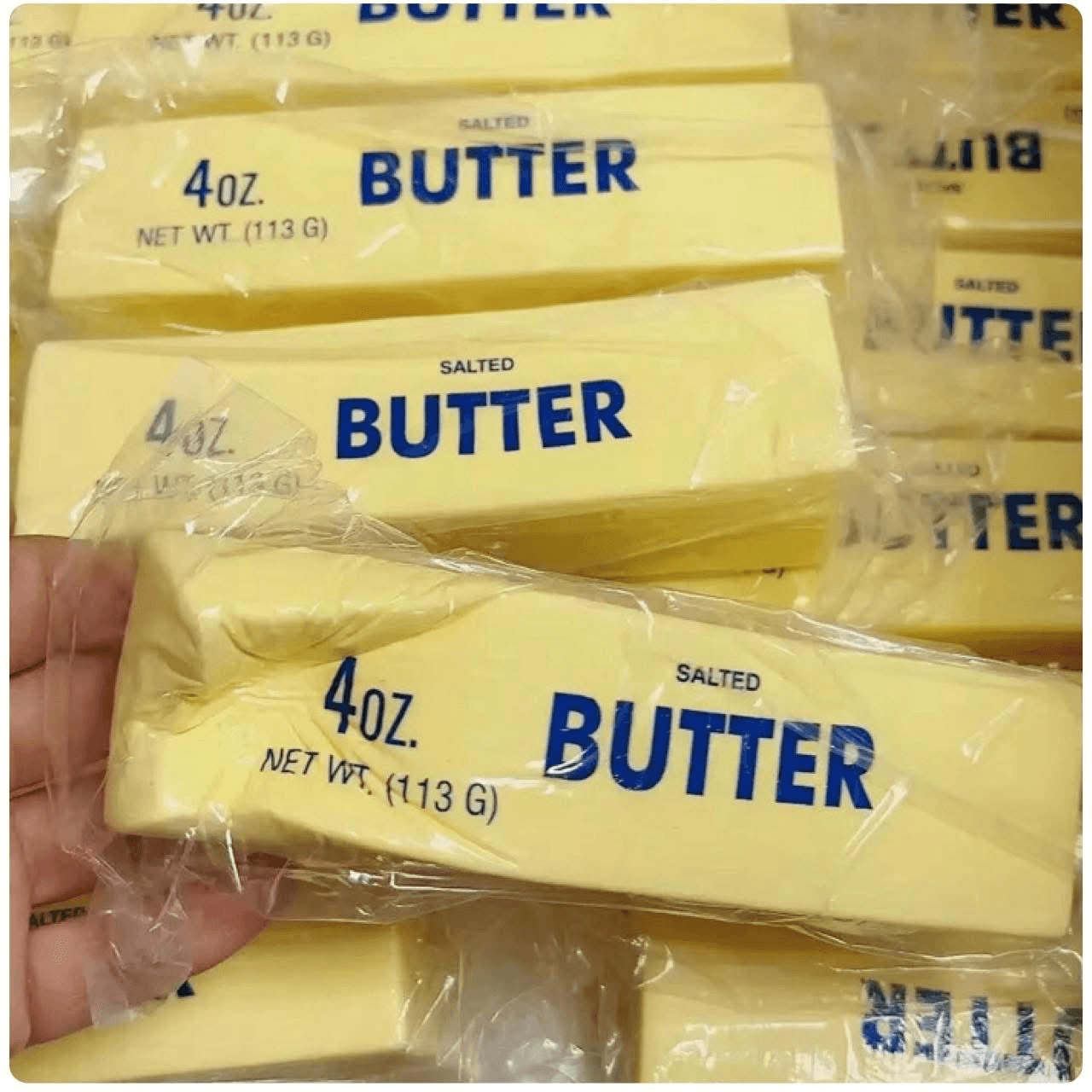 PREORDER - Butter Squishy display with salted butter sticks, promoting preorder opportunity for unique squishy product.