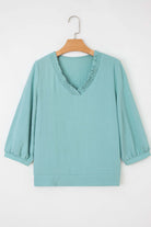 GRACEFUL GLOW TOP (jade sea) featuring a frilled V-neckline and bracelet sleeves in a trendy jade sea color.