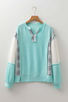AQUA AVENUE TOP in aqua ribbed texture with plaid and colorblock design, perfect for casual wear.