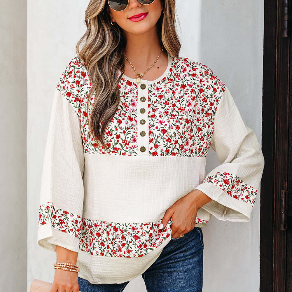 CROSSROADS CUTIE floral blouse with Henley button neckline and 3/4 sleeves, perfect for stylish everyday wear.