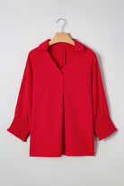 TRUE PASSION TOP in fiery red with V-neck collar and shirred 3/4 sleeves, perfect for a chic and comfortable look.