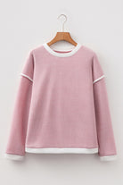 Blushline Beauty Top in soft blush hue with contrast trim, featuring drop shoulder and loose silhouette for relaxed style.