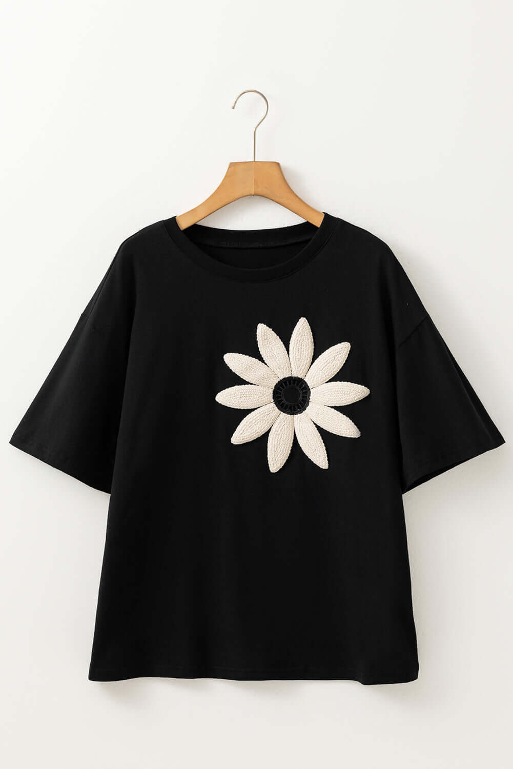 Moonlit Daisy Crochet Graphic Tee with relaxed drop shoulder and floral design.