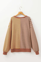 MAPLE CIDER CREWNECK TOP featuring a colorblock stripe design in brown and orange, cozy oversized sweatshirt for fall.