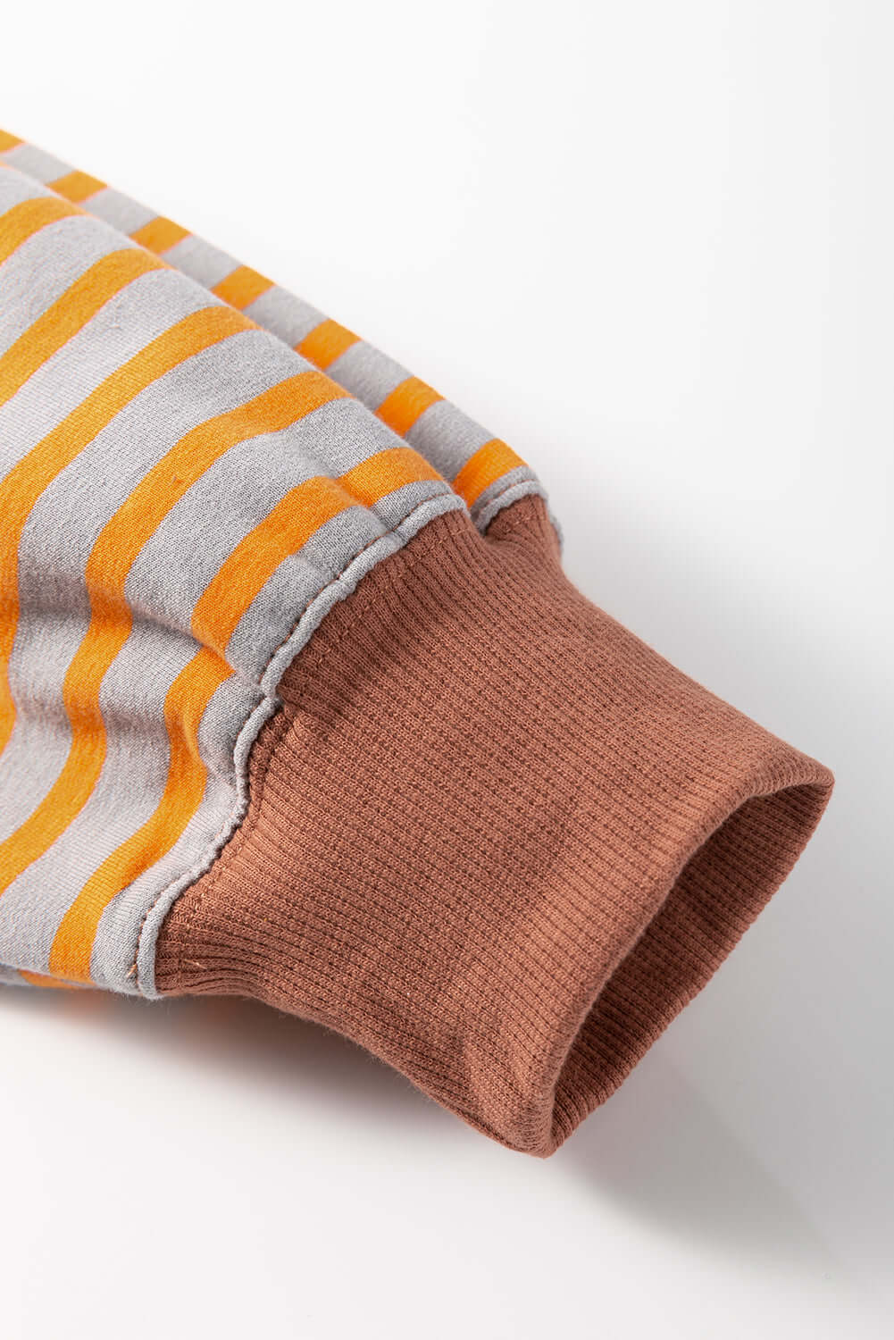 MAPLE CIDER CREWNECK TOP featuring a brown stripe colorblock design and relaxed fit, ideal for cozy fall outfits.
