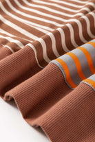 MAPLE CIDER CREWNECK TOP featuring a cozy brown stripe colorblock design with orange and gray accents.