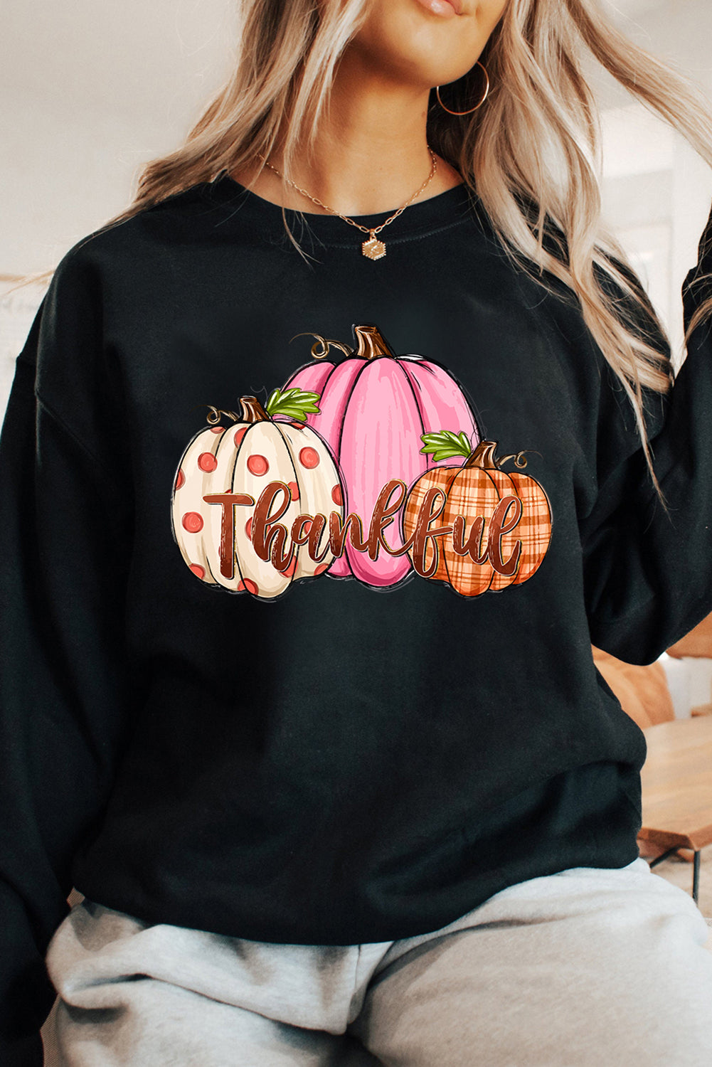 So Thankful crewneck featuring playful pumpkins, perfect for cozy Thanksgiving style, ideal for casual holiday wear.