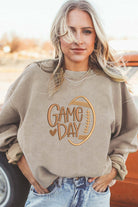 LOVE OF THE GAME CORDED CREW in Harvest Beige with embroidered 'Game Day' lettering and football accent.