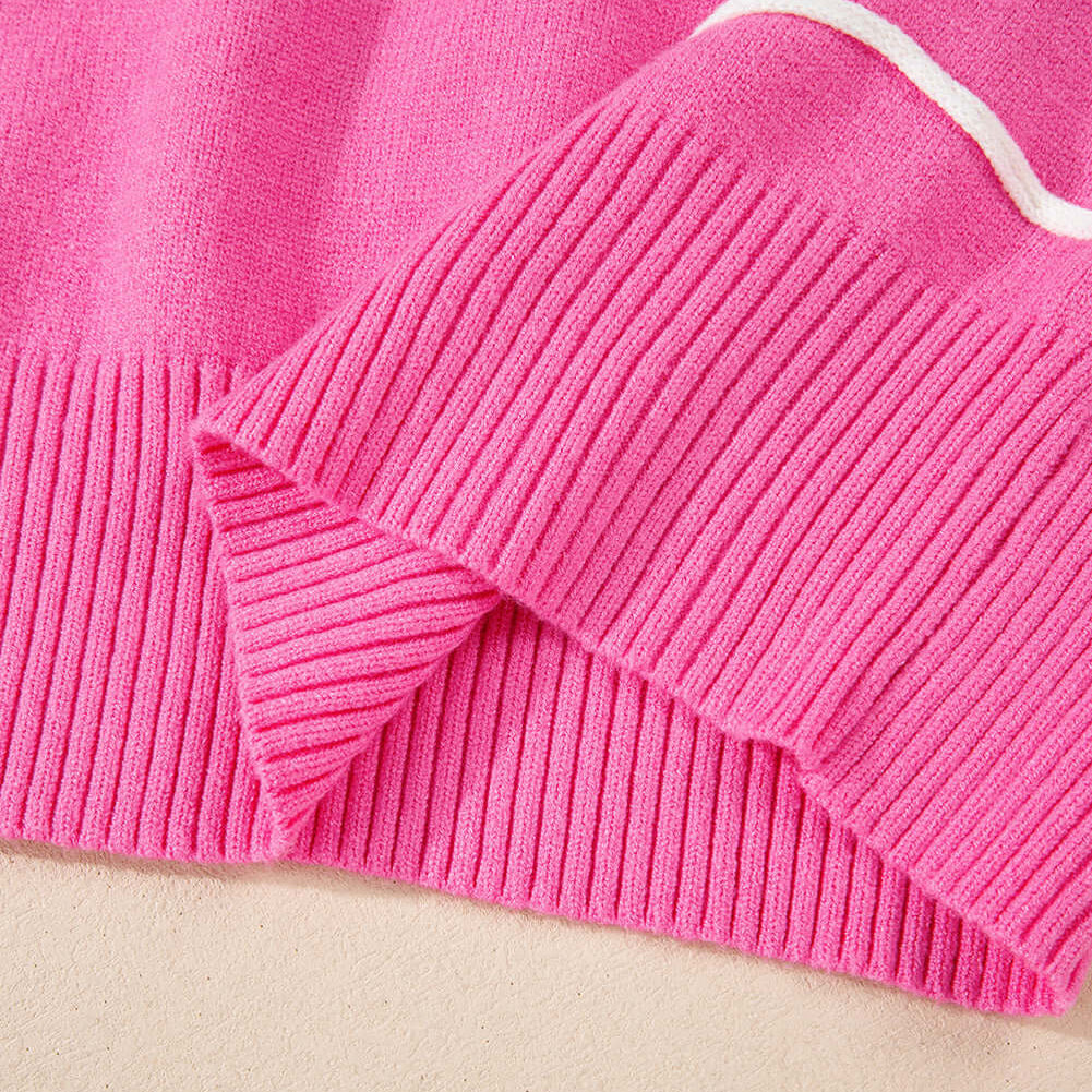 Detail of the TRIP TO REMEMBER Sweater featuring ribbed cuffs and pretty-in-pink color.