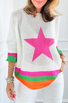 Starstruck Sweater featuring a bold pink star and vibrant colorblock design on soft, lightweight fabric.