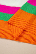 Colorblock design and vibrant stripes of the STARSTRUCK SWEATER highlighting its playful charm and cozy style.