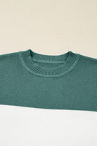 MOUNTAIN AIR SWEATER close-up texture in Marina Blue and Cream color block design on a soft knit fabric.