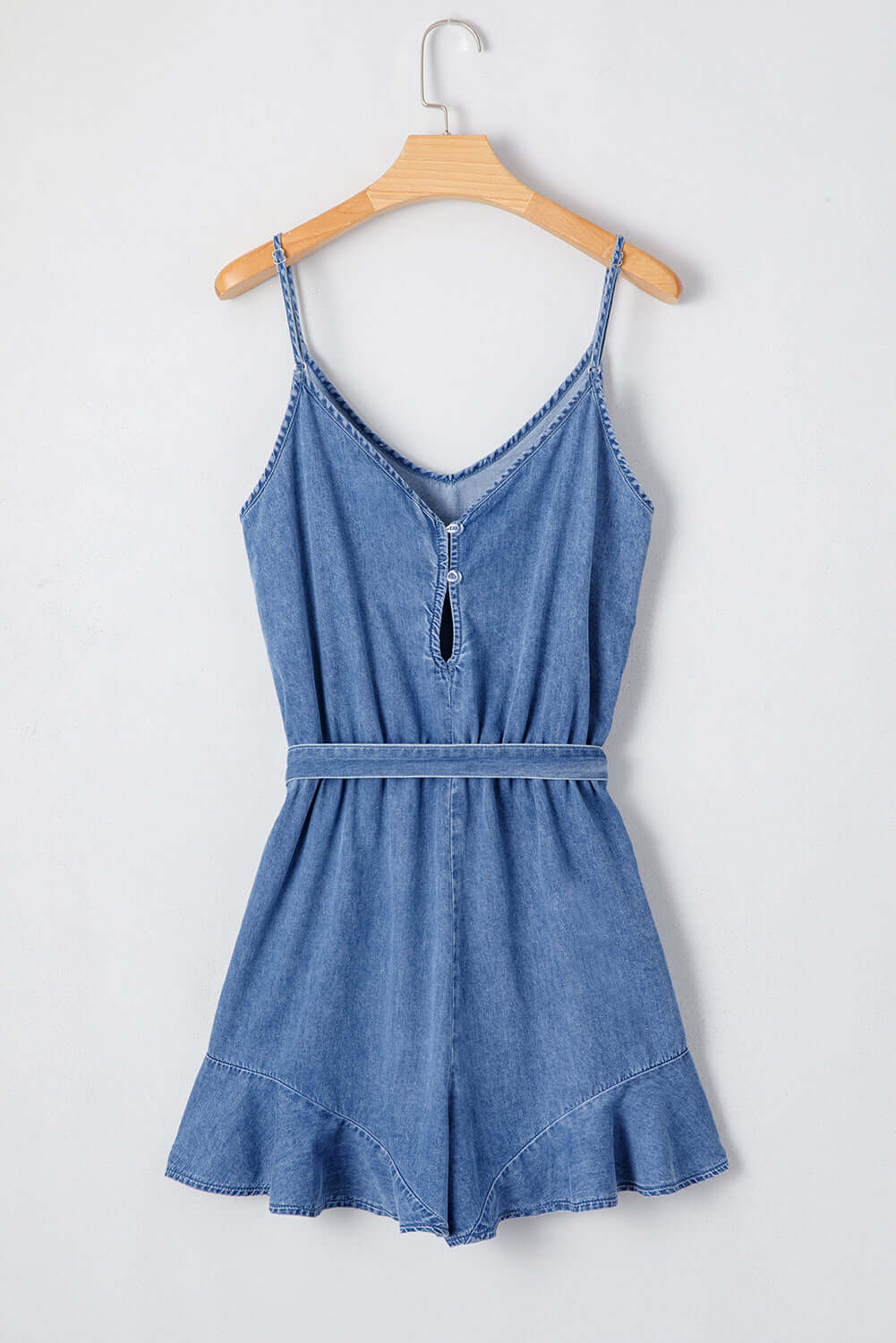 Shore Thing Denim Romper in medium blue wash, featuring adjustable straps and a flattering design, perfect for summer.