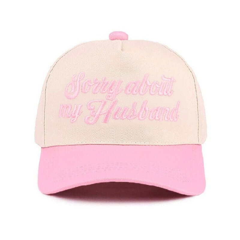 SORRY ABOUT MY HUSBAND HAT (6 colors) in cream and pink with embroidered text for a fun, cheeky statement.
