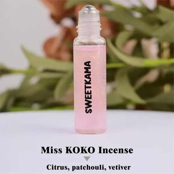 SWEET SCENTS PERFUME ROLLER 2 IN 1 featuring Miss KOKO Incense with citrus, patchouli, and vetiver in a sleek bottle.