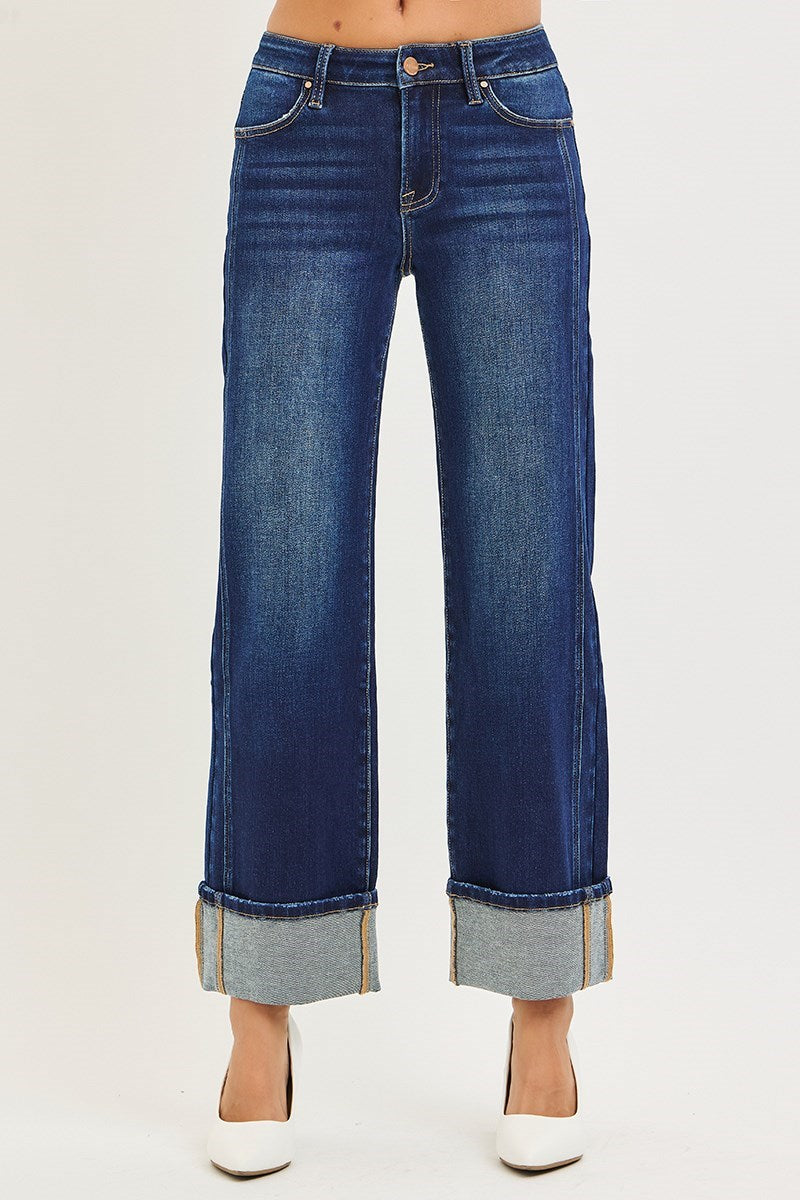 CHARLEIGH JEANS by Risen dark wash cuffed wide leg jeans with mid-rise waist and airy silhouette.