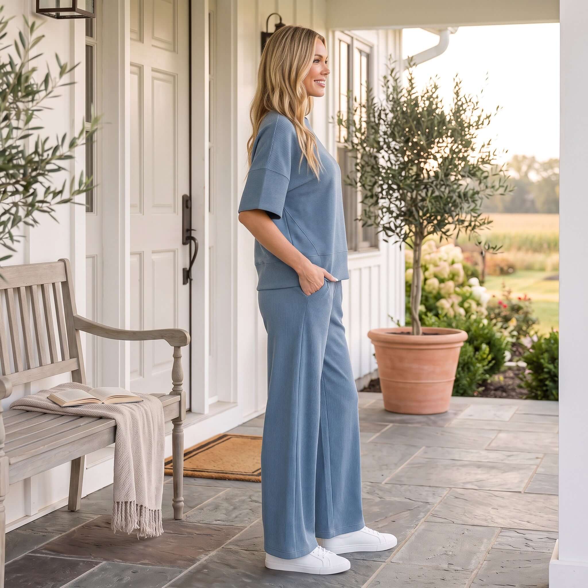 Woman wearing BLUE HAZE PANTS SET by Zenana, relaxed style with a round-neck top and coordinating pants.