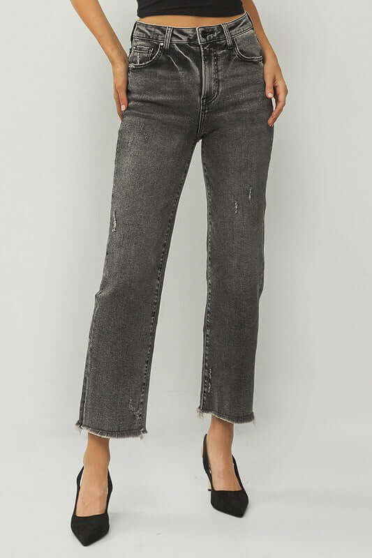 High rise straight leg acid wash black Veronica jeans with frayed hem and stylish fit.