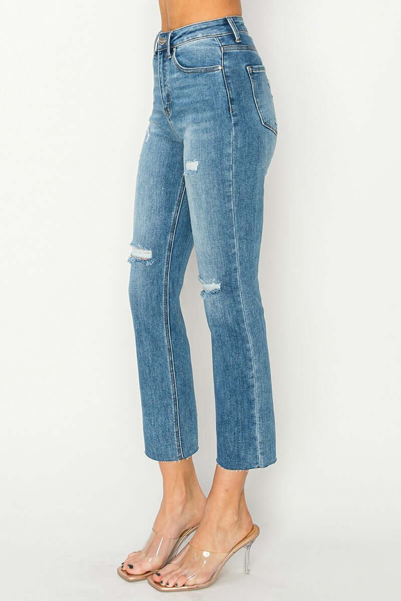 Side view of Risen Celeste High-Rise Distressed Slim Straight Jeans, showcasing modern style and comfort.