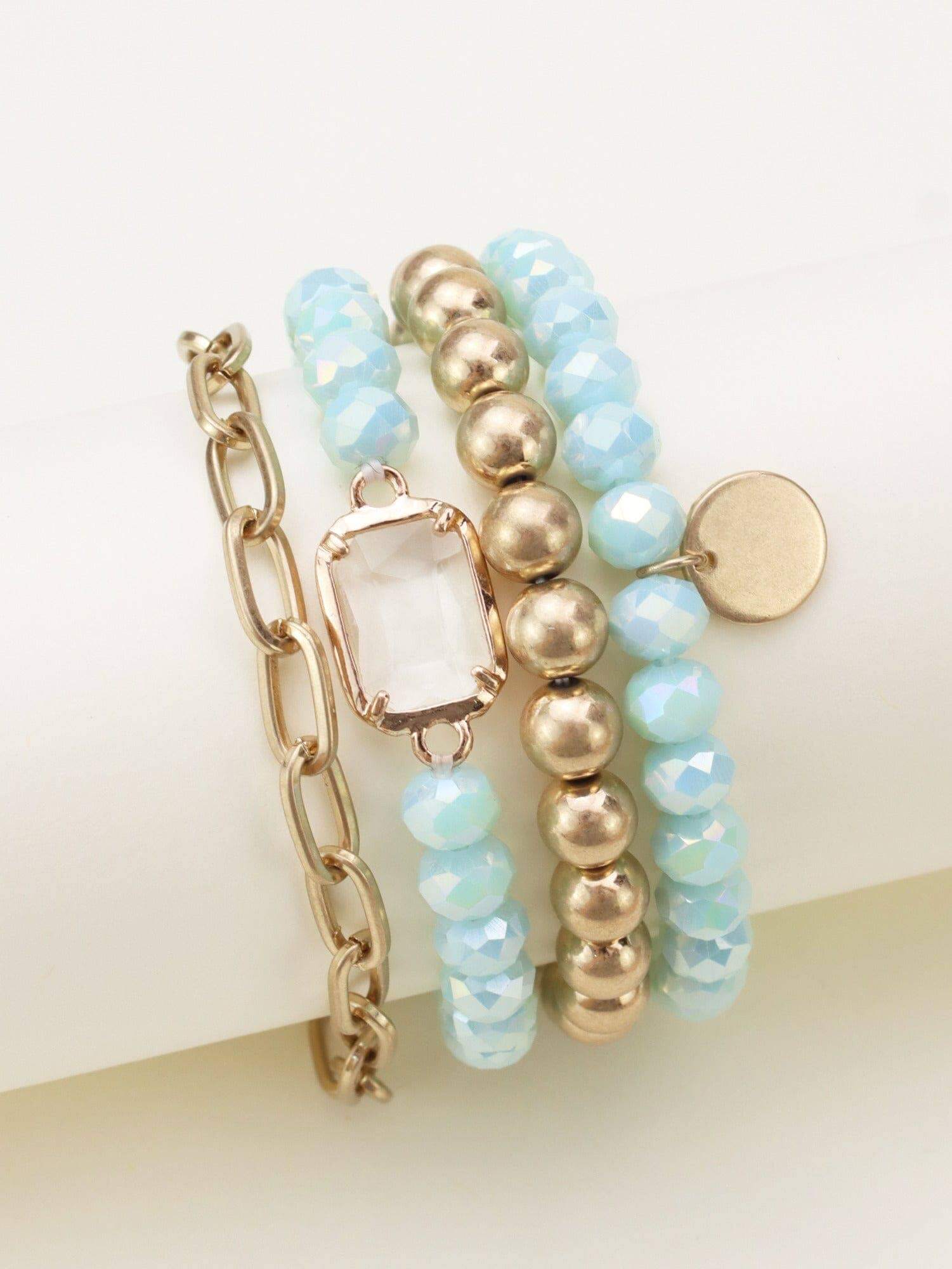 Prism Collection 4-piece bracelet set featuring sparkly pastel beads and metallic accents.