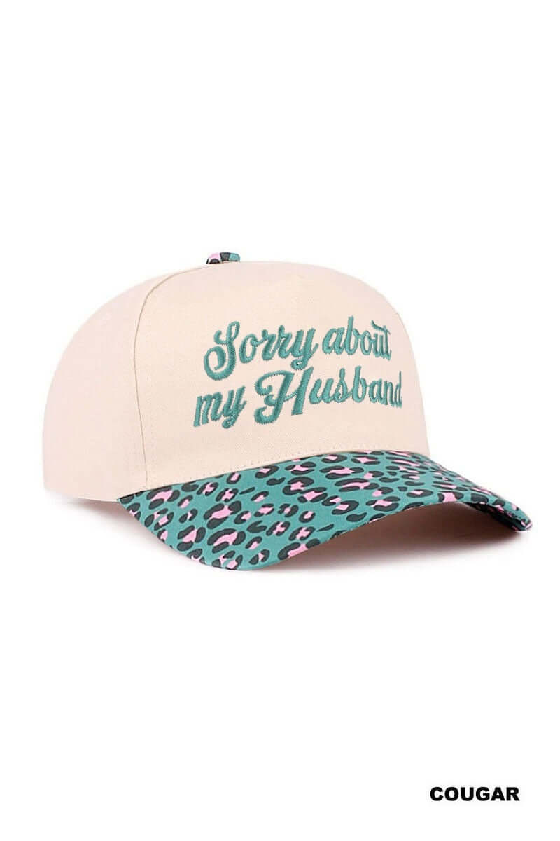 SORRY ABOUT MY HUSBAND HAT (6 colors) in cream with leopard print bill, perfect for casual days and fun statements.