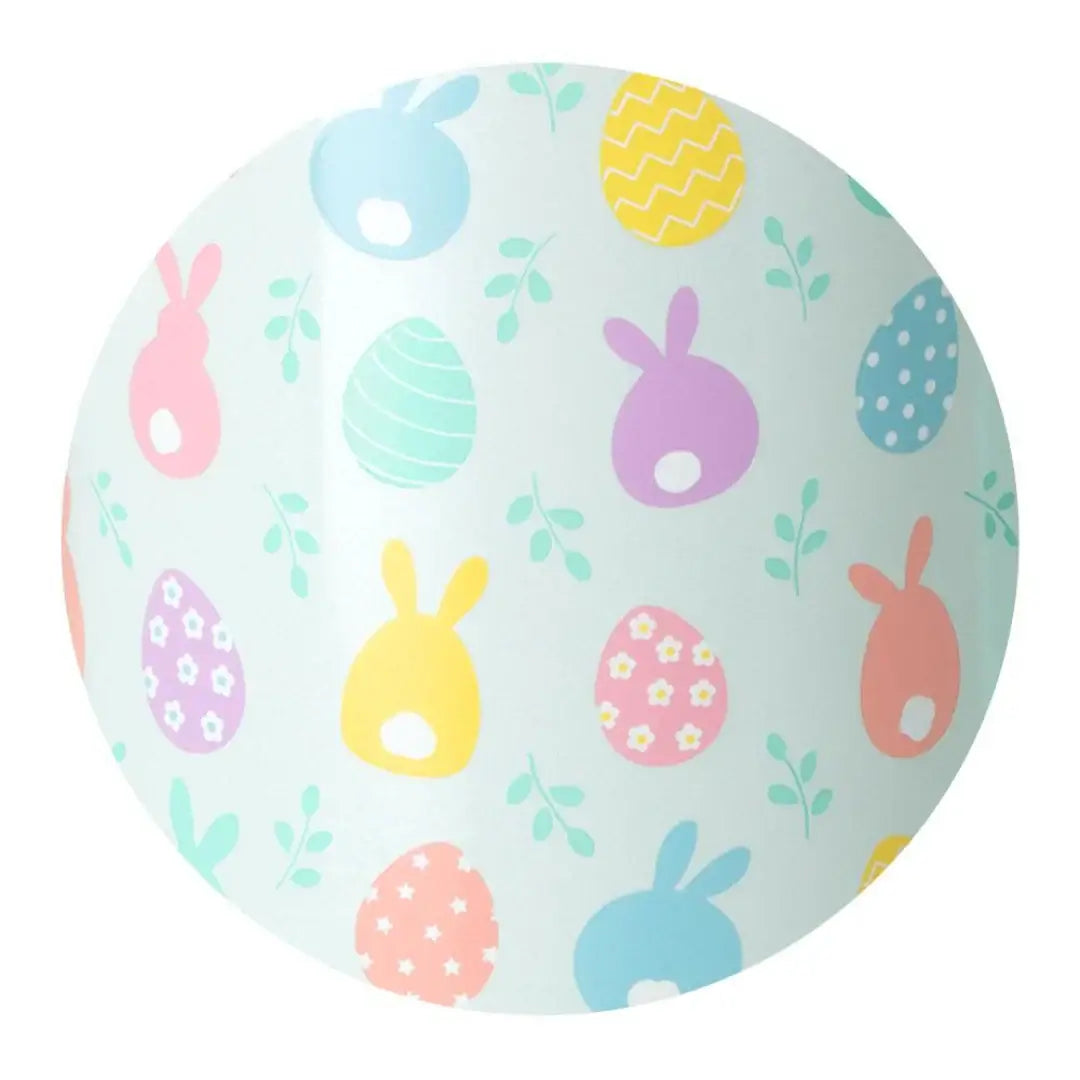 Colorful Easter-themed ball featuring bunnies and eggs in pastel colors, ideal for spring activities.