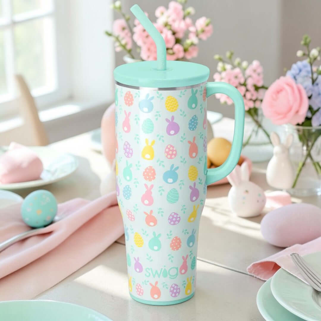 EGG HUNT 40 OZ MEGA MUG - Swig Life in pastel colors with bunnies and eggs on a spring table setting.