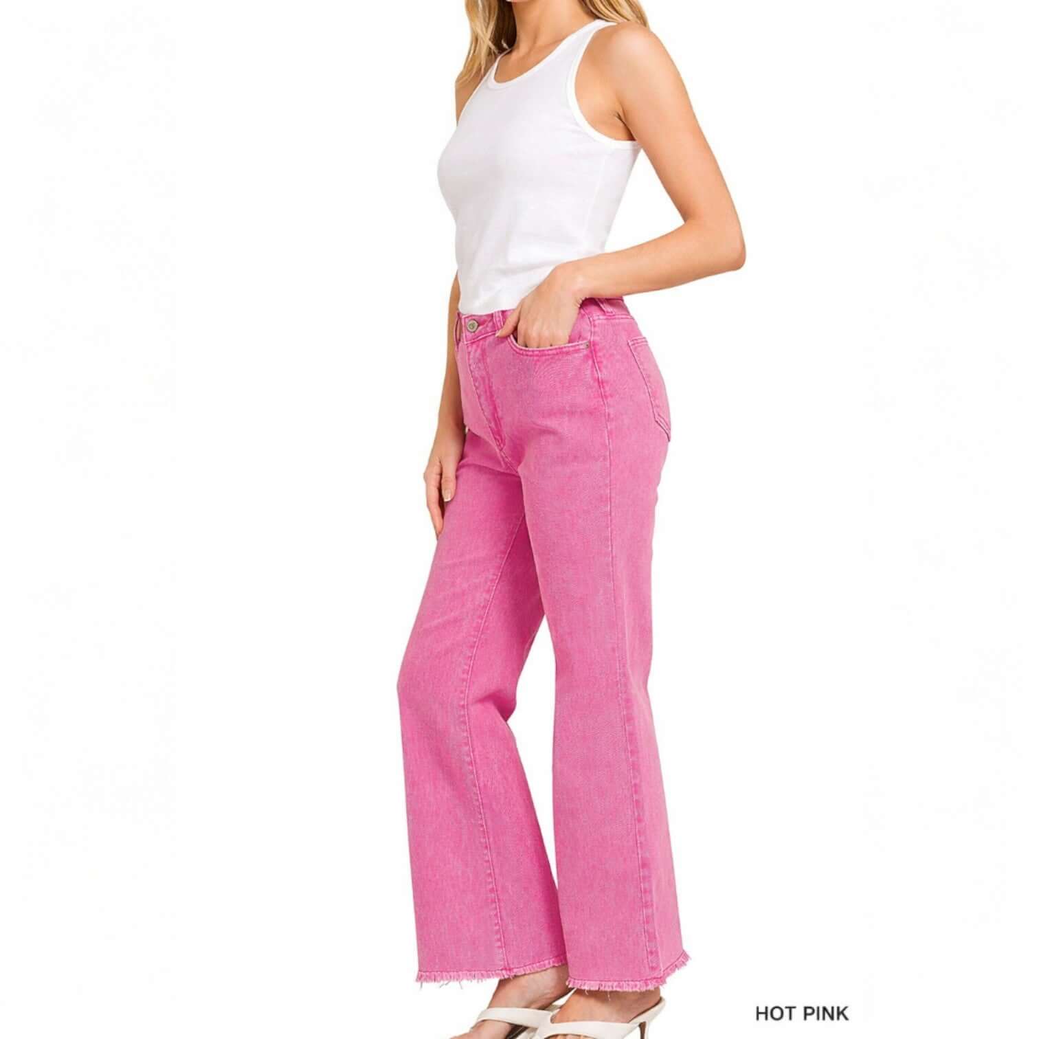 Model showcasing COLOR CRUSH DENIM - Zenana in hot pink wide leg jeans with frayed hem.