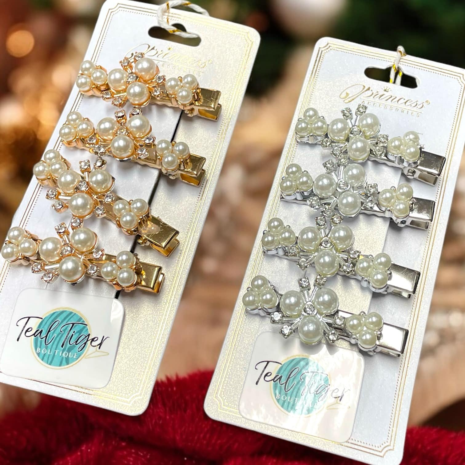 Four-piece hair clip set with pearl and rhinestone accents in gold and silver, ideal for elegant holiday styling.