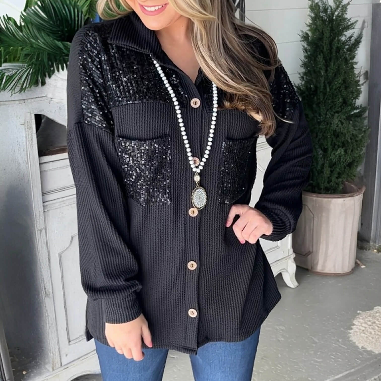 CITY LIGHTS TOP - Black corded shacket with sequin patch pockets, styled with a necklace, perfect for everyday glam.